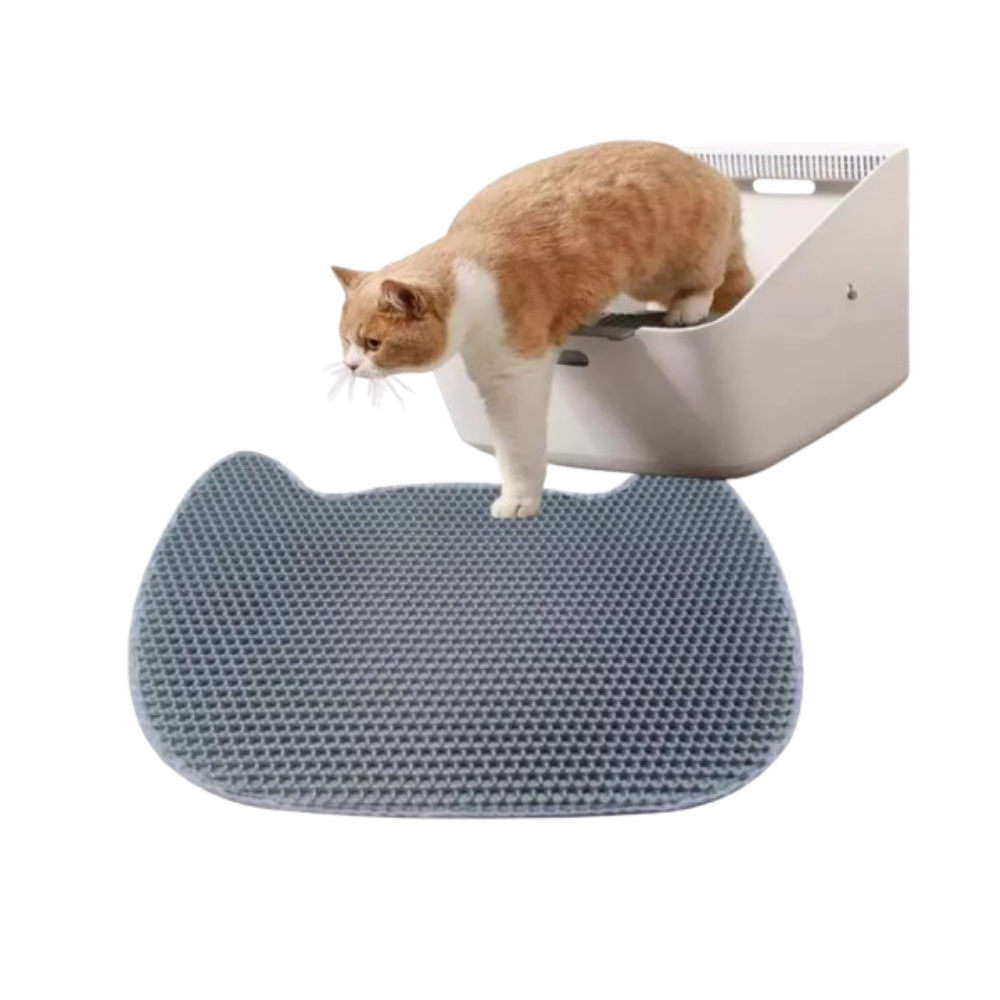 Alfombra sanitaria doble capa para gatos frente al arenero
